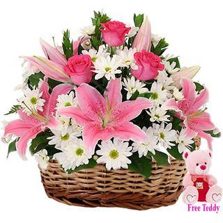 Pink roses white lilies basket with free 6 inch Teddy